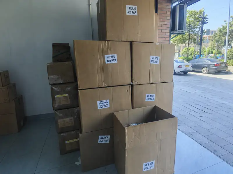 Custom Pilates grip socks with retail packaging